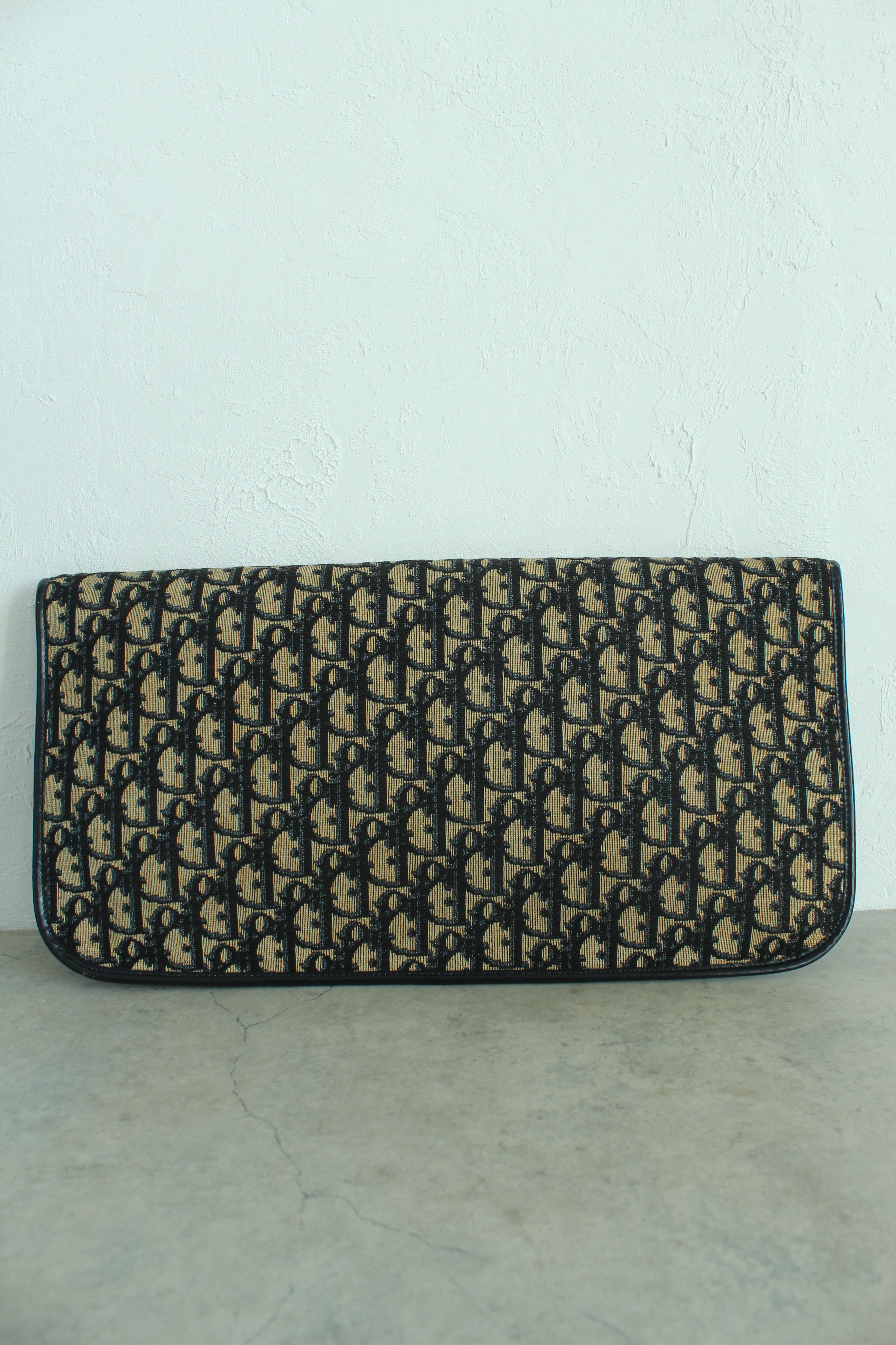 Oblique Fold over clutch in navy blue