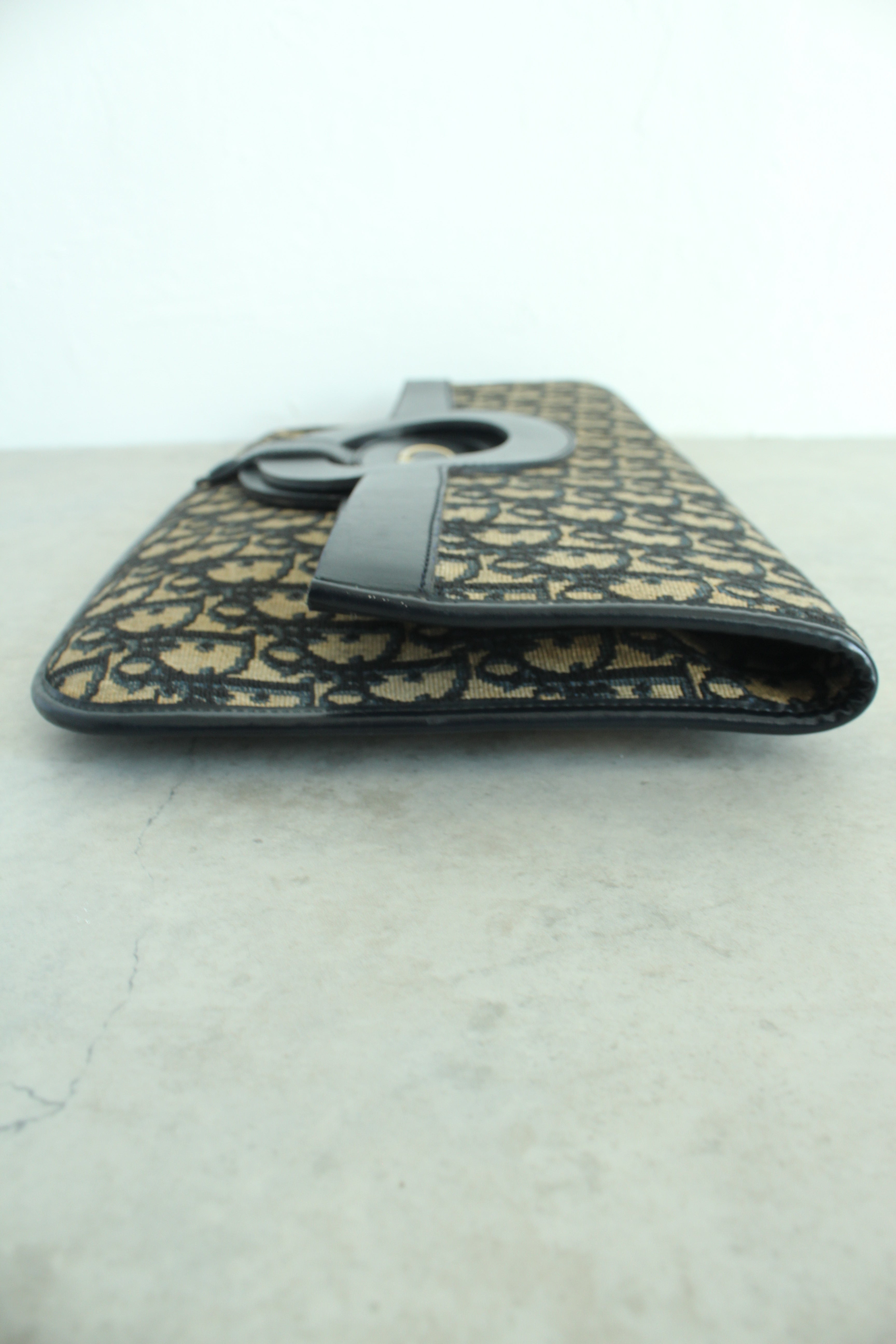Oblique Fold over clutch in navy blue