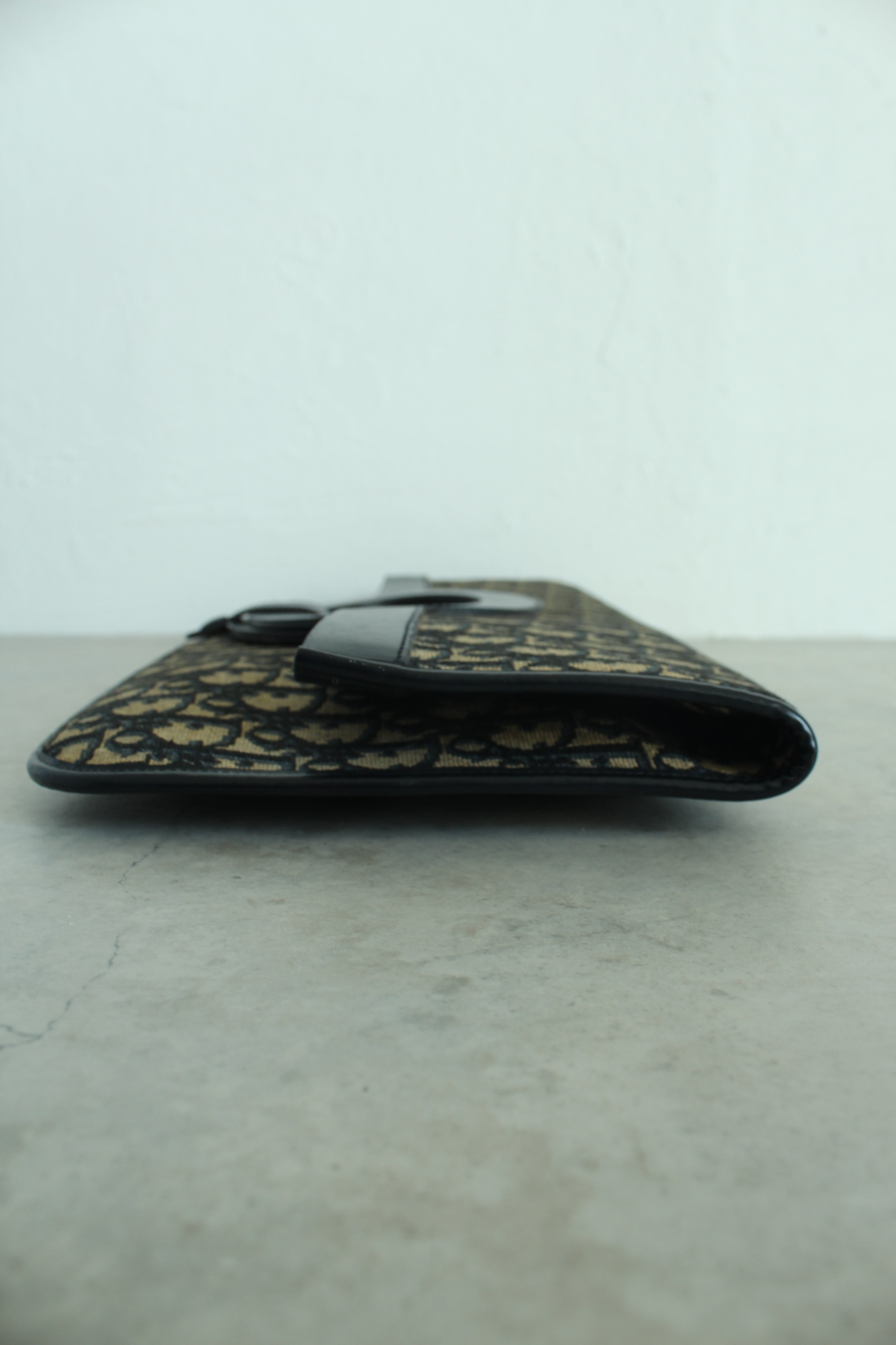 Oblique Fold over clutch in navy blue