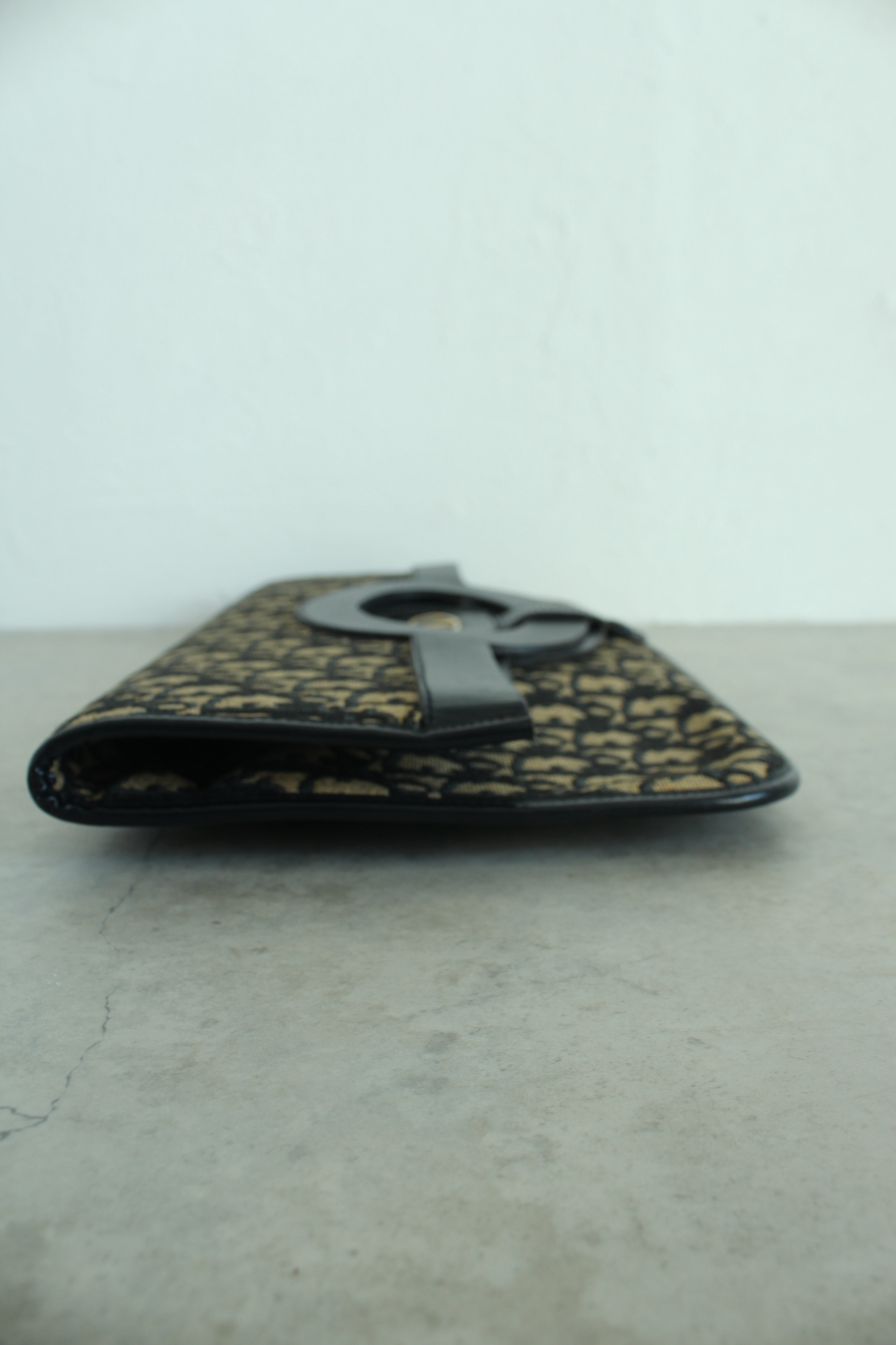 Oblique Fold over clutch in navy blue