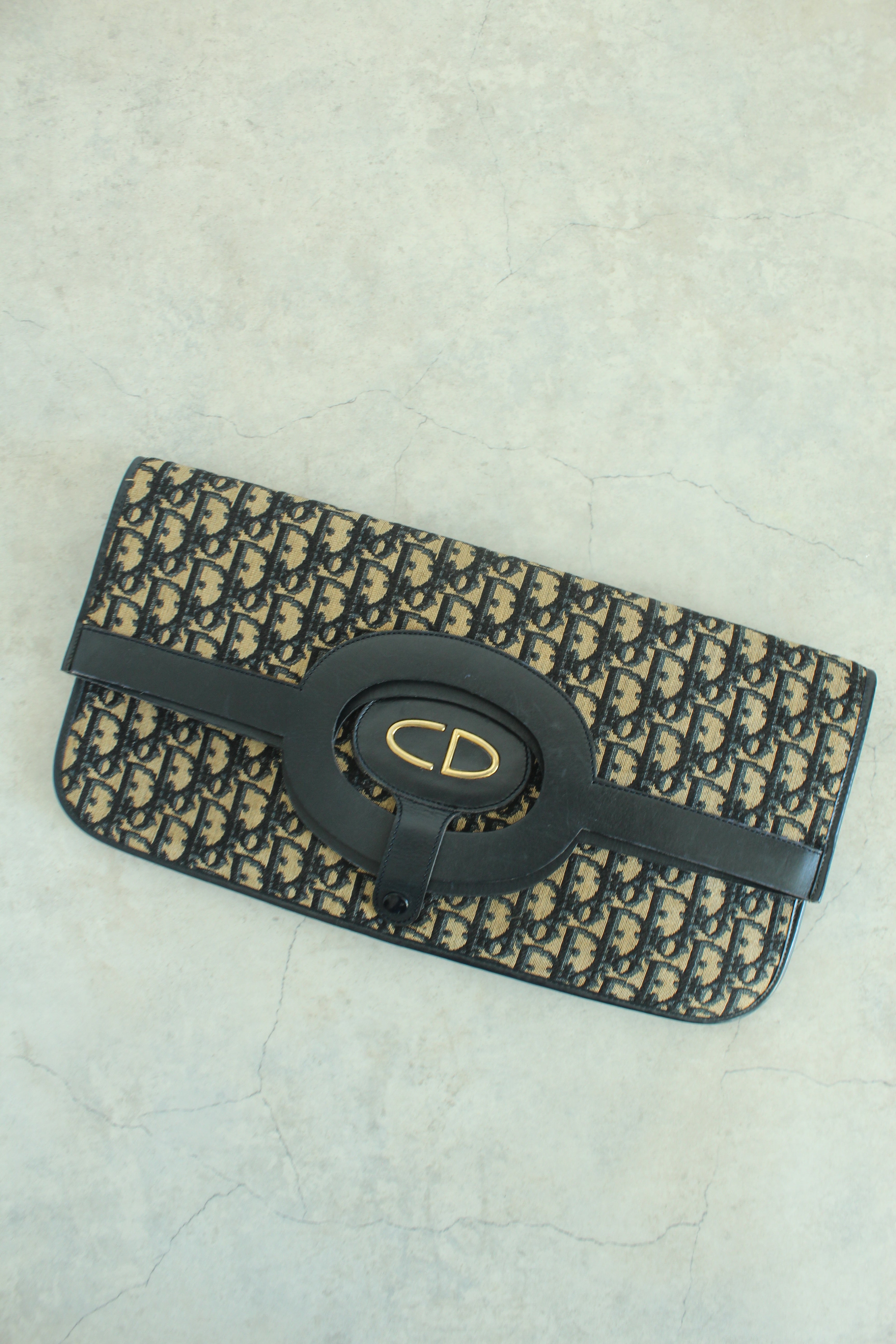 Oblique Fold over clutch in navy blue