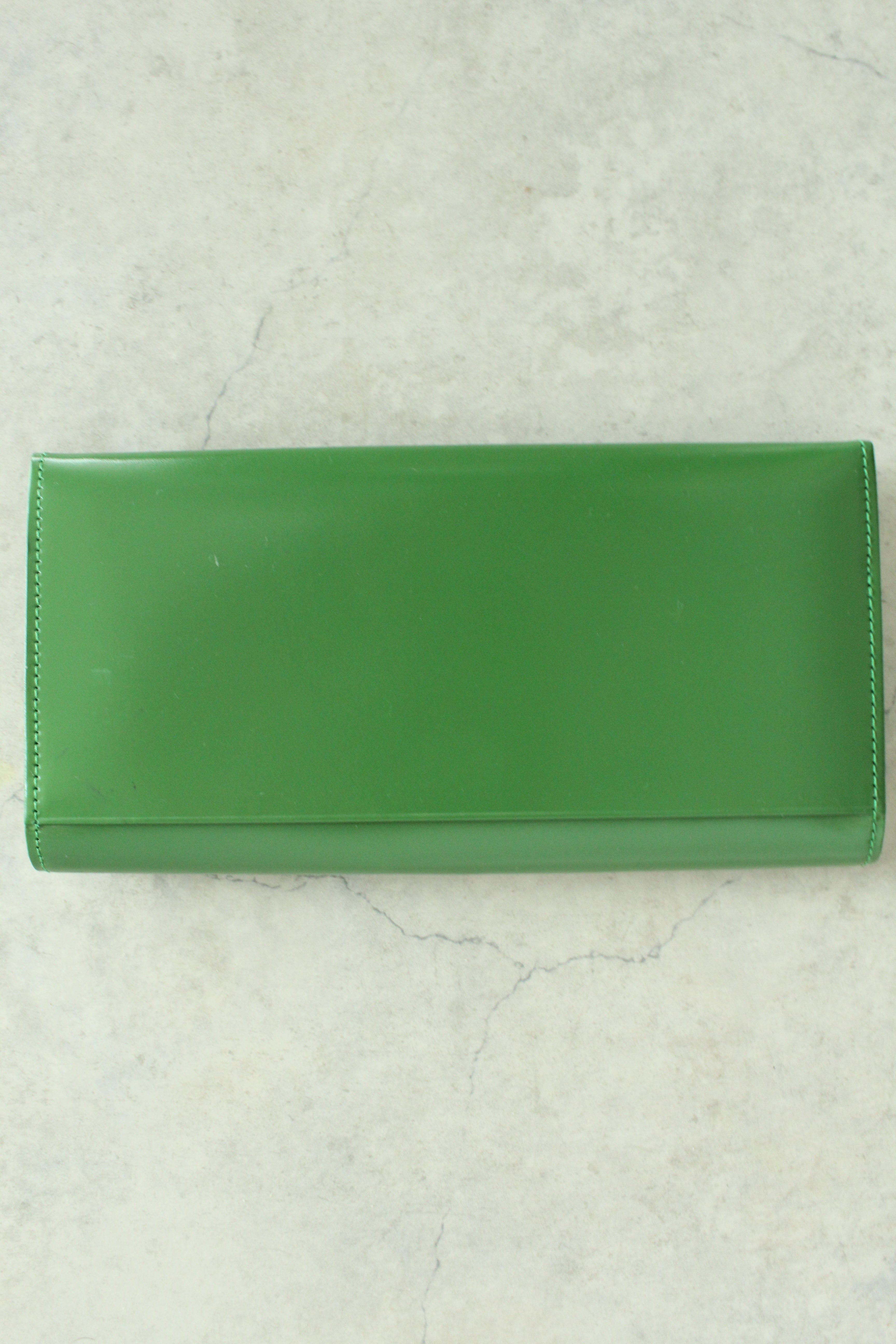 Gold heart logo wallet /clutch in Green