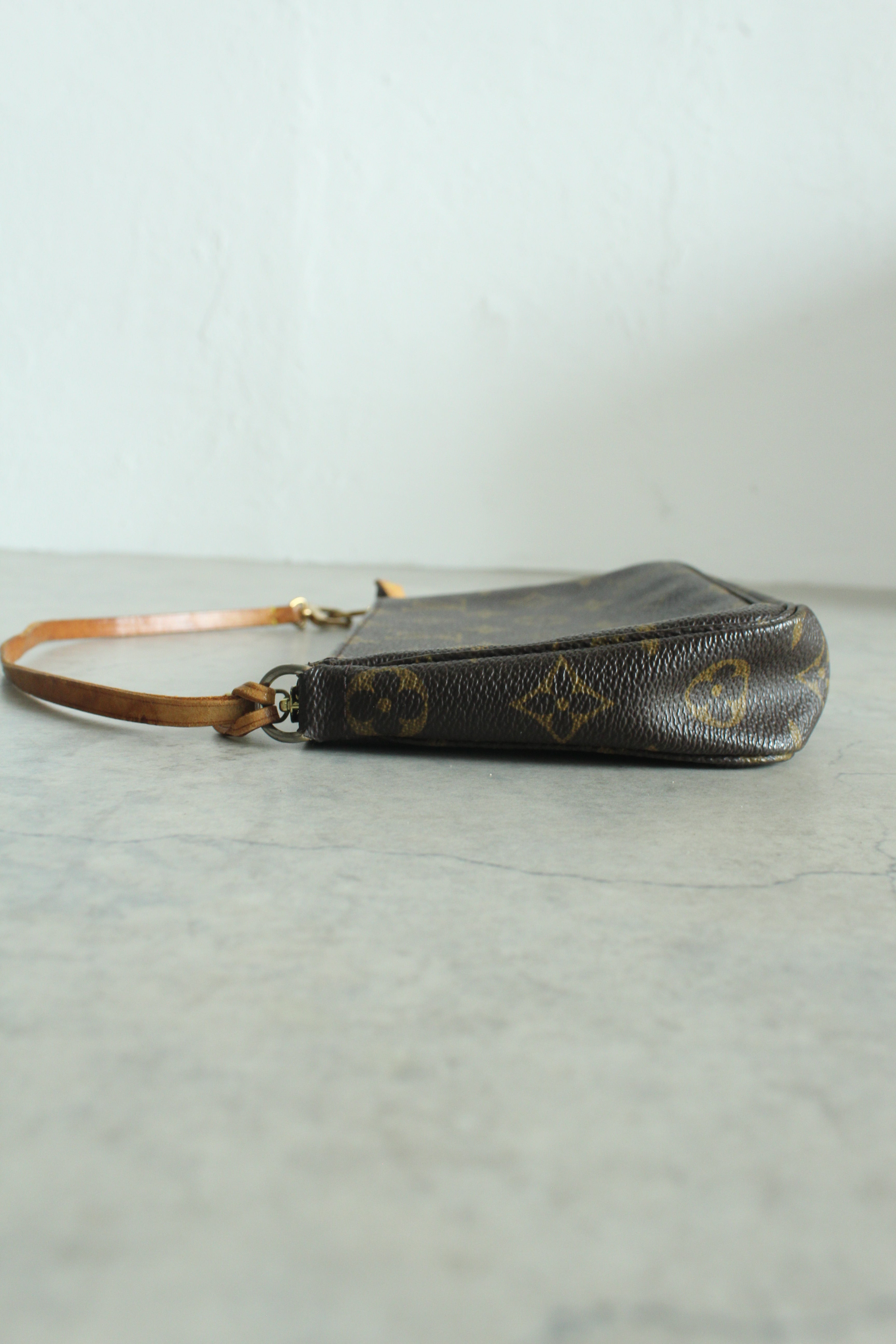 Pochette Accessoires Monogram Canvas (M82766) with a bag charm