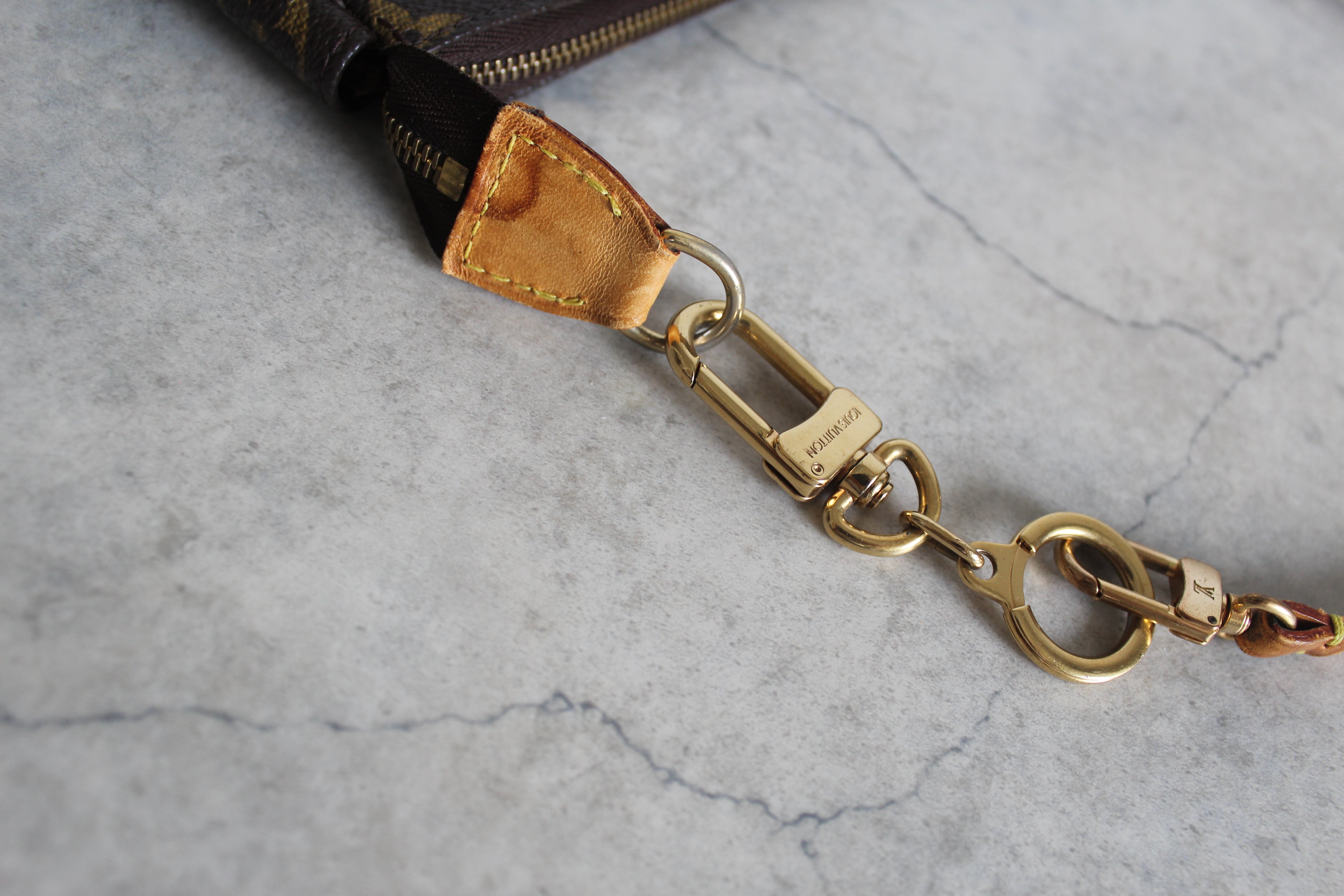 Pochette Accessoires Monogram Canvas (M82766) with a bag charm