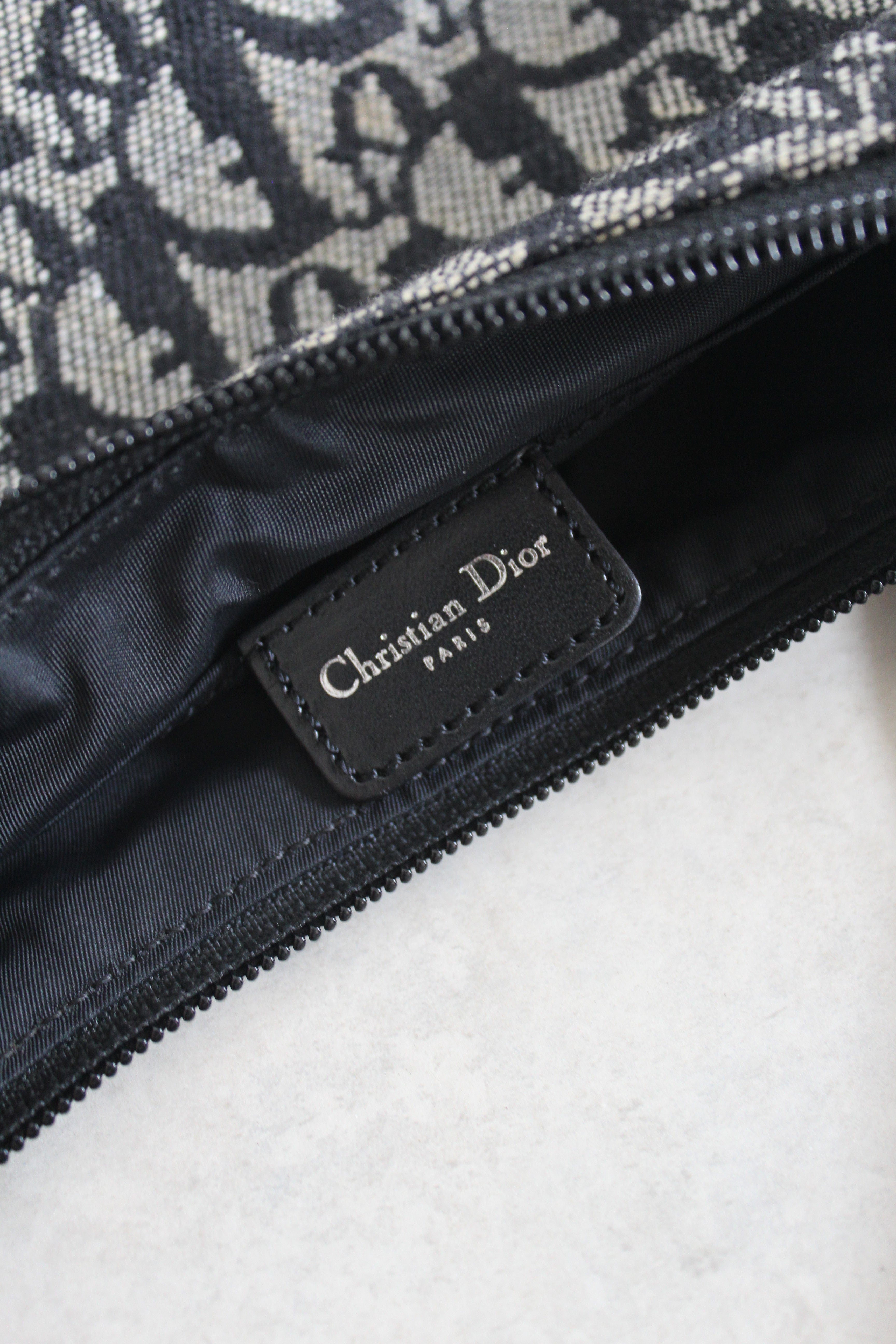 Trotter oblique mini pochette — John Galliano era