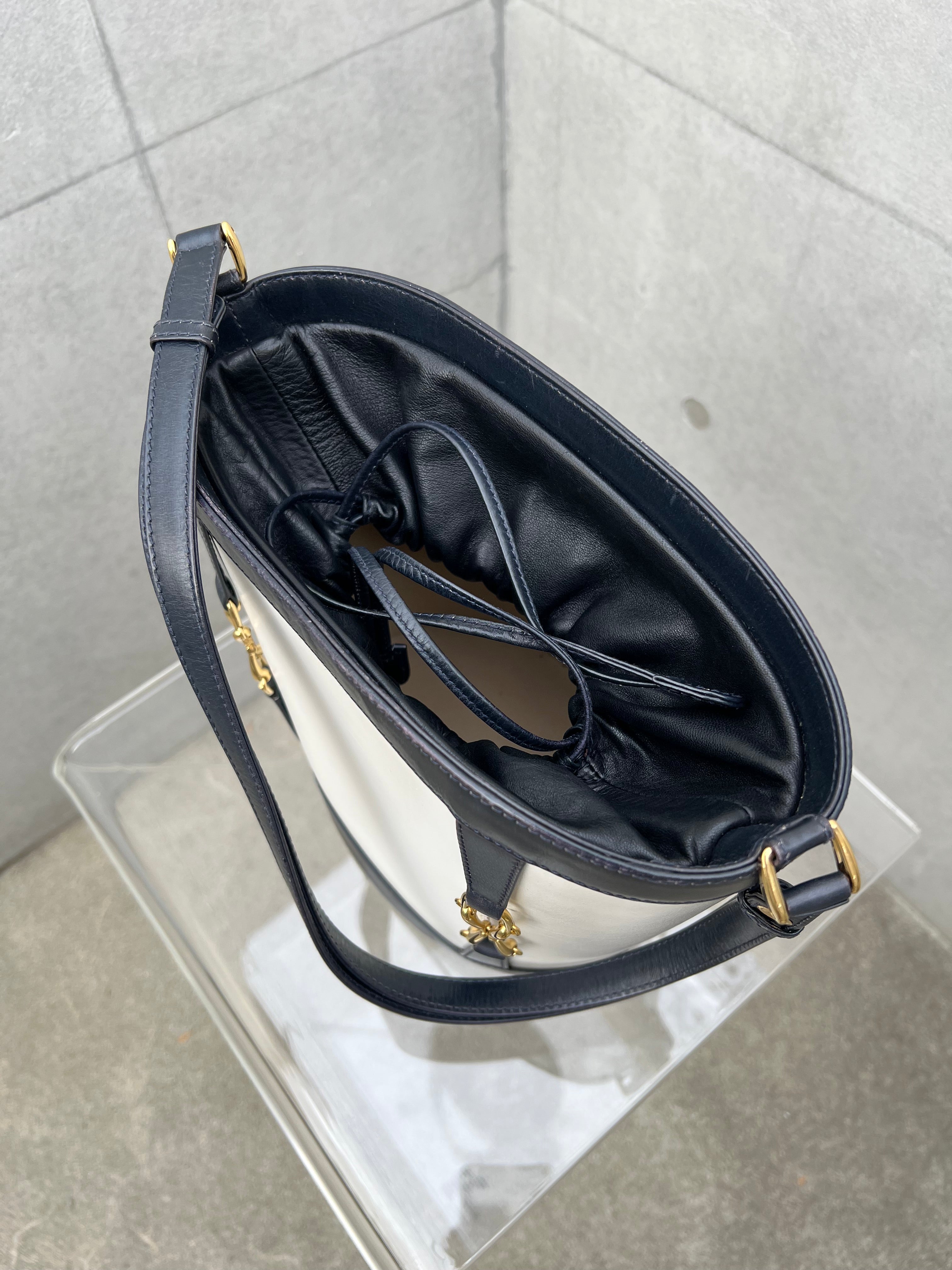 Horsebit Bucket Bag in Black and White