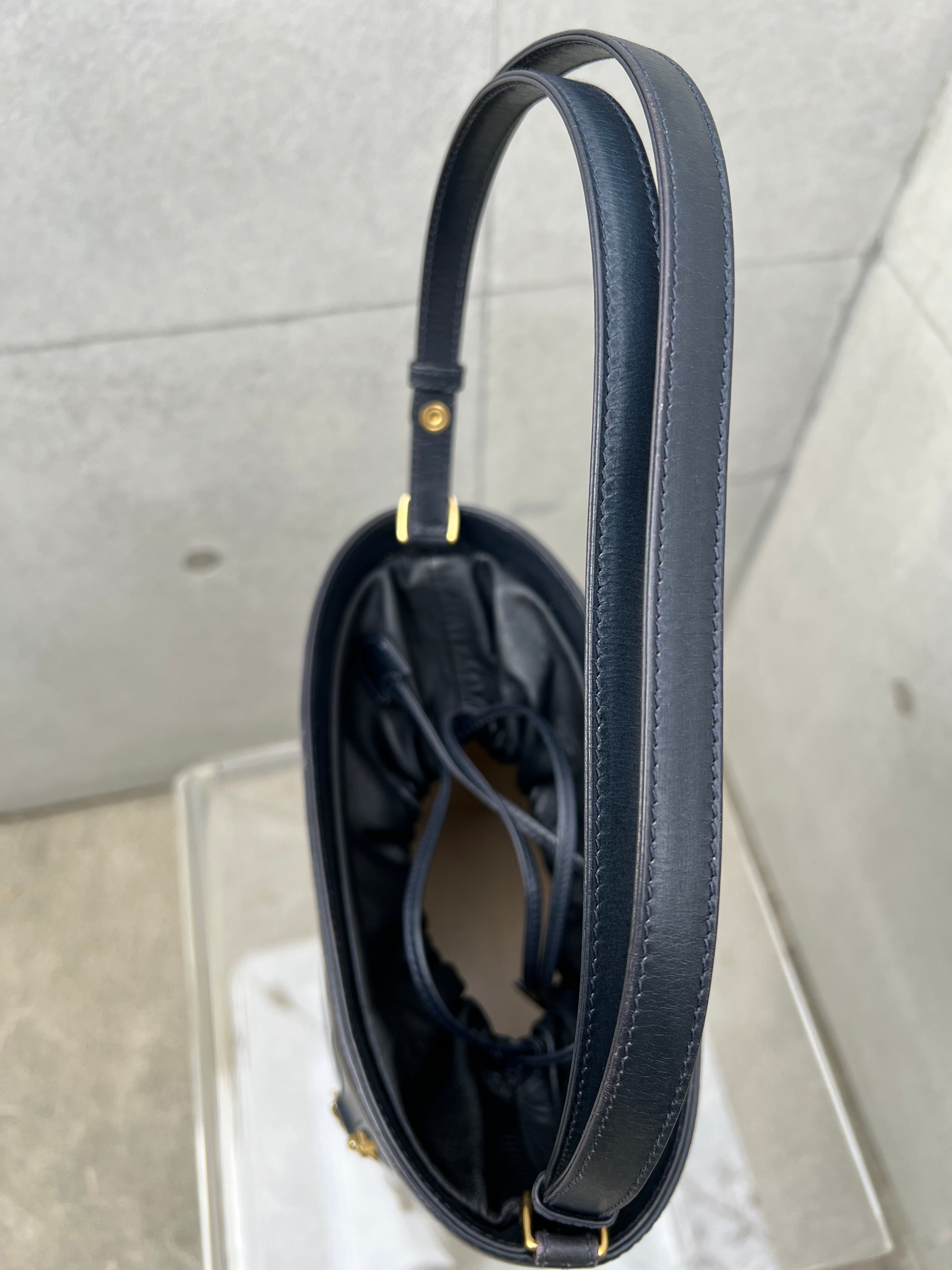 Horsebit Bucket Bag in Black and White