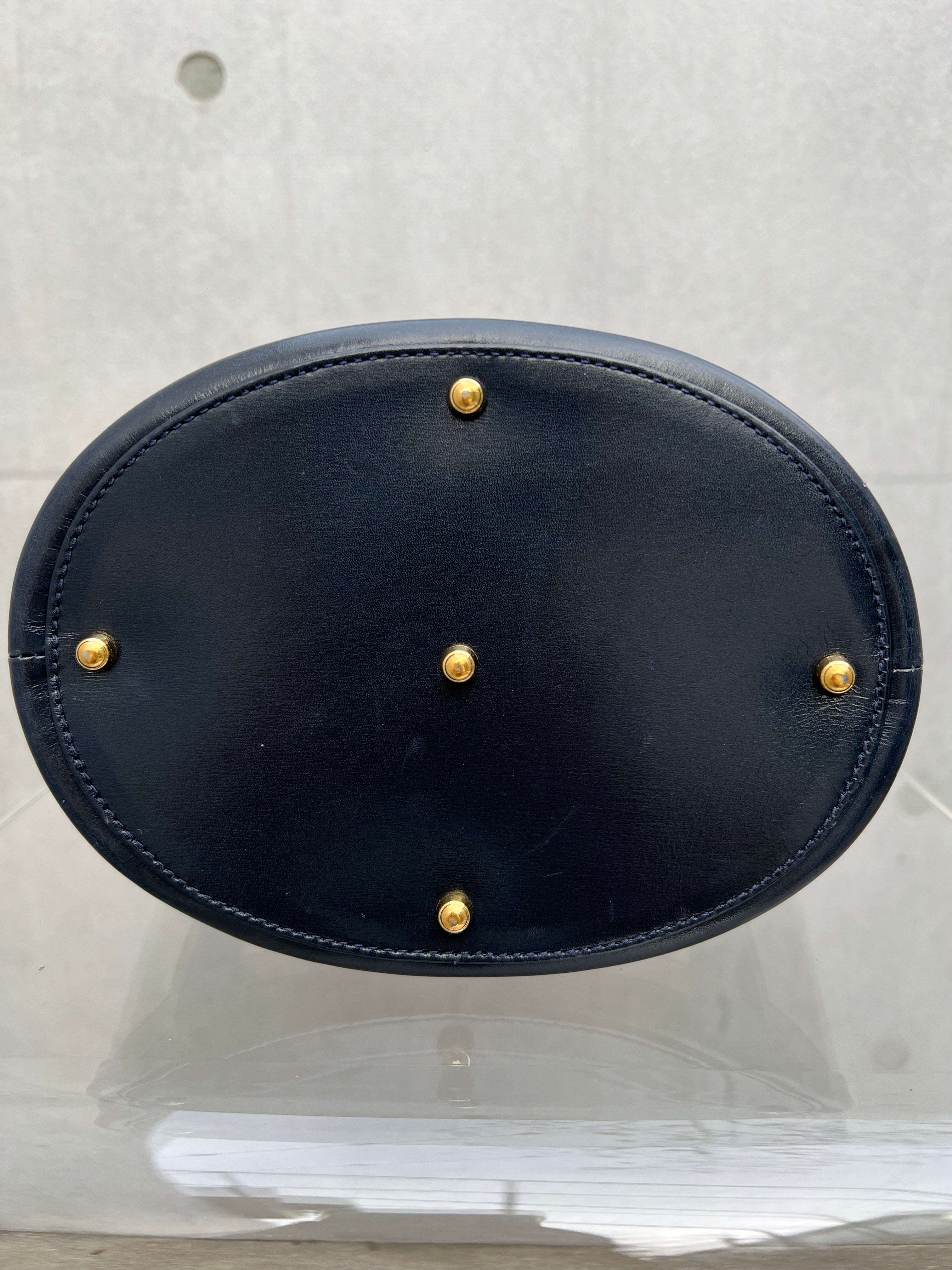 Horsebit Bucket Bag in Black and White