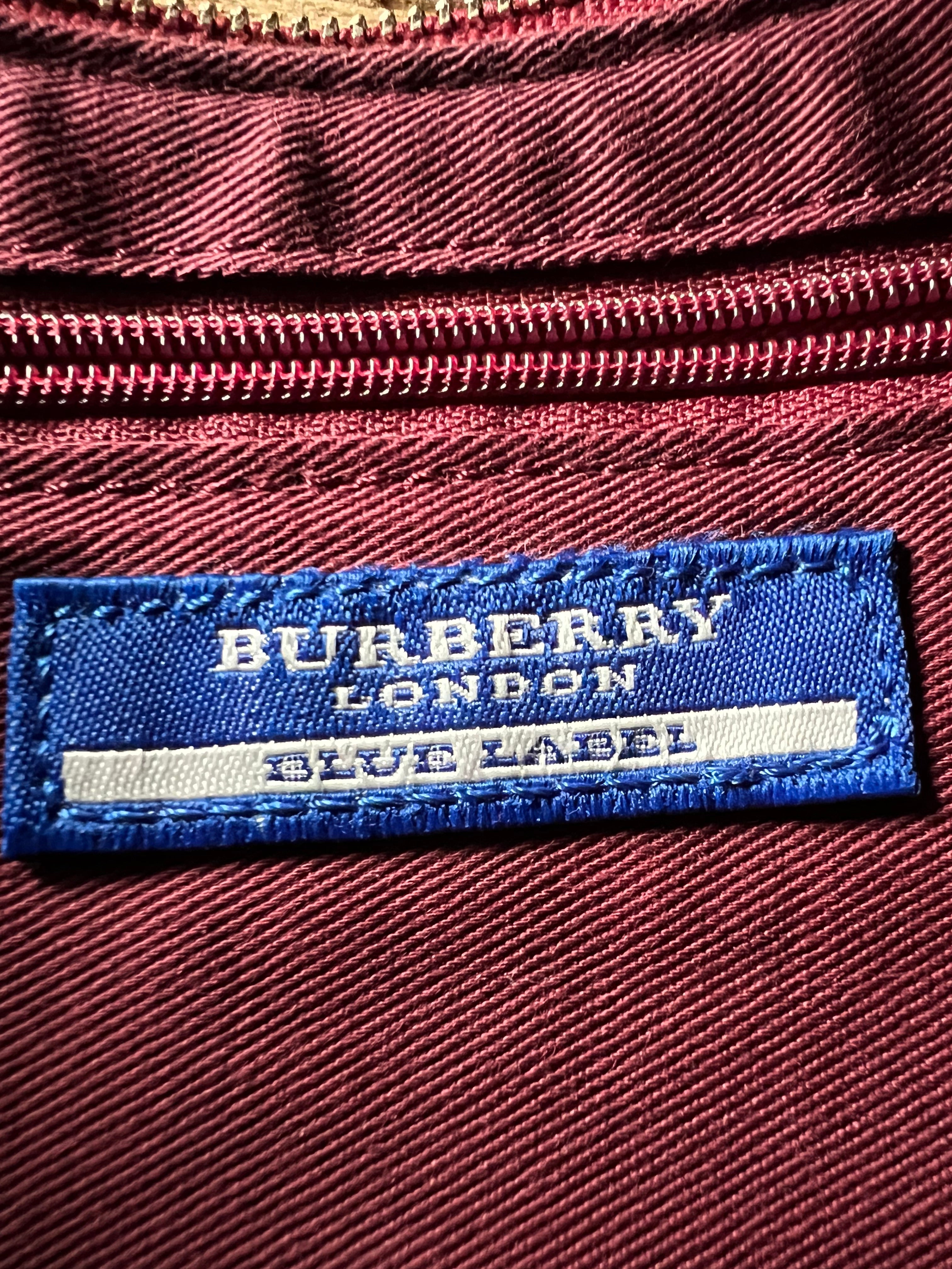 Nova Check Crescent-Shaped Accessory Pouch in Burgundy
