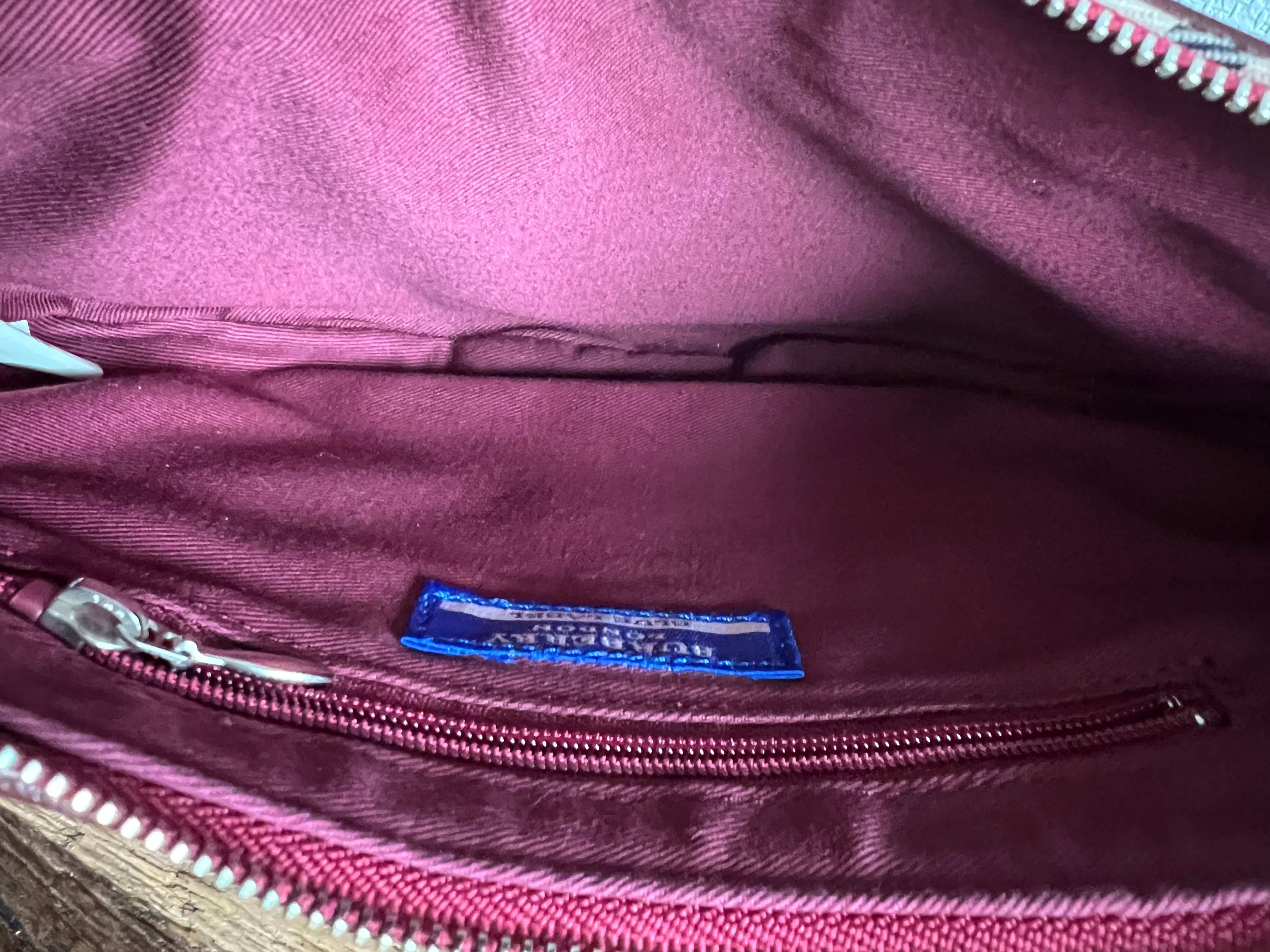 Nova Check Crescent-Shaped Accessory Pouch in Burgundy