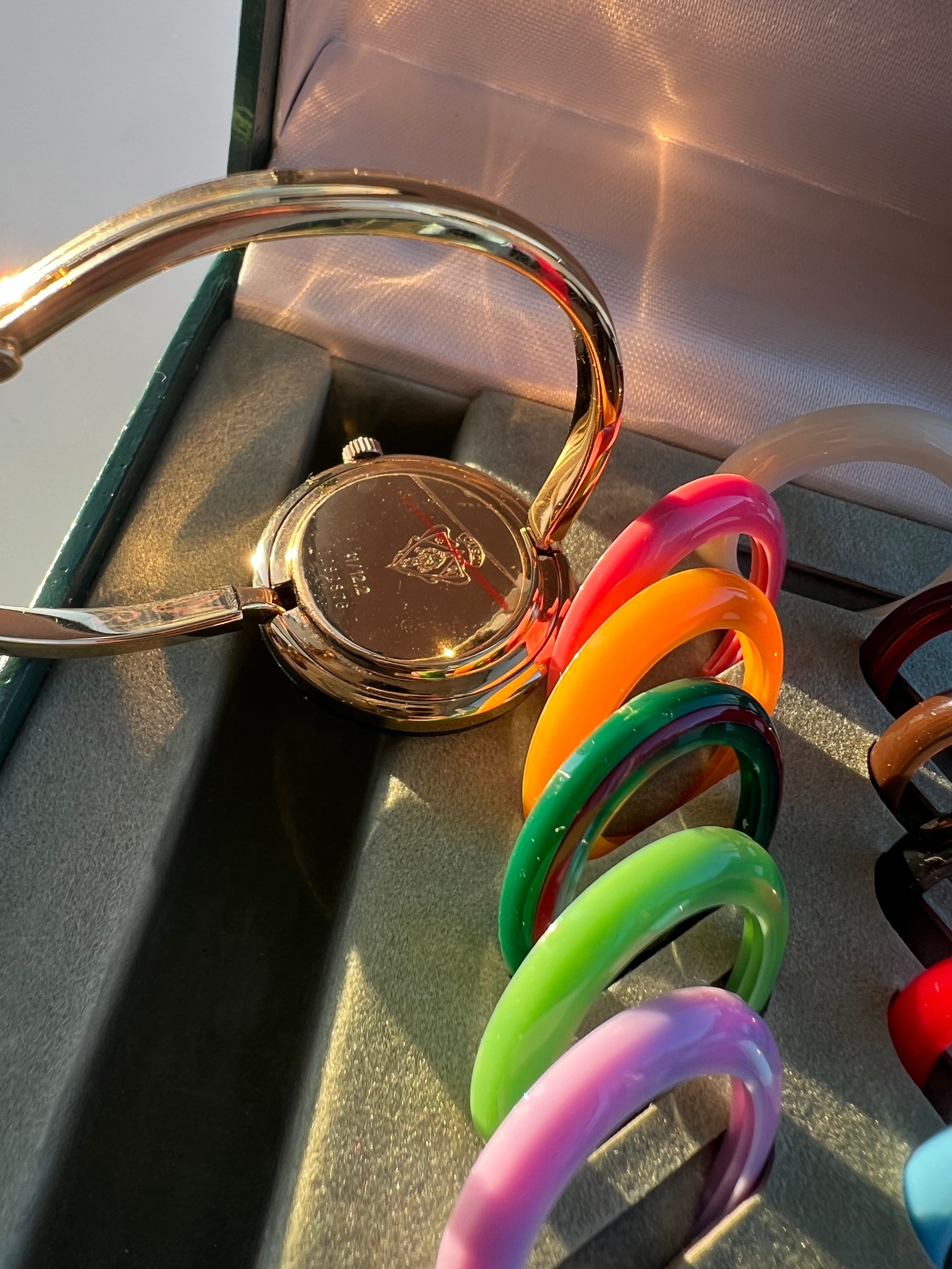 1100L Gold Interchangeable Bezel Watch Set in 12 colors, 1995