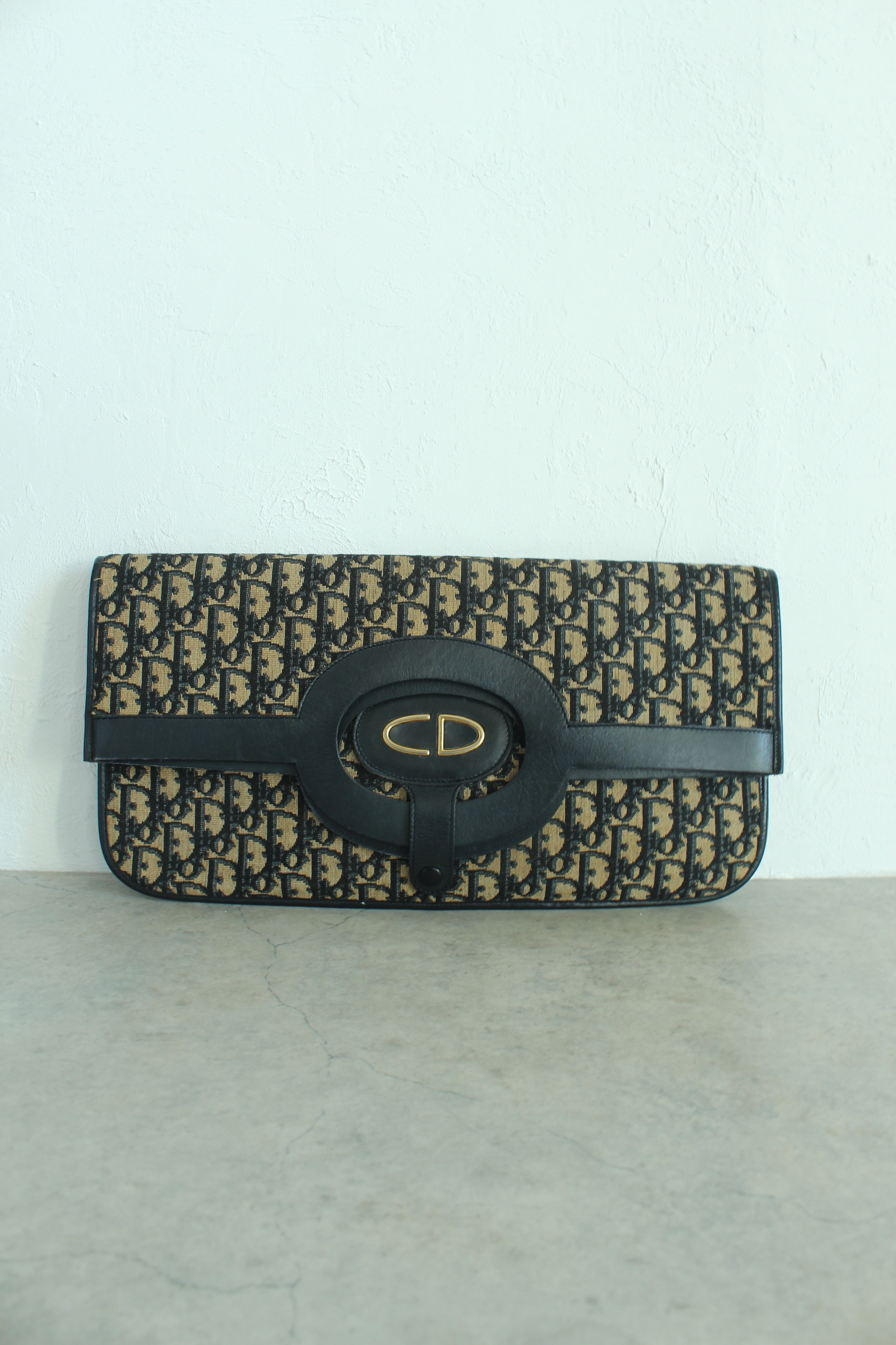 Oblique Fold over clutch in navy blue