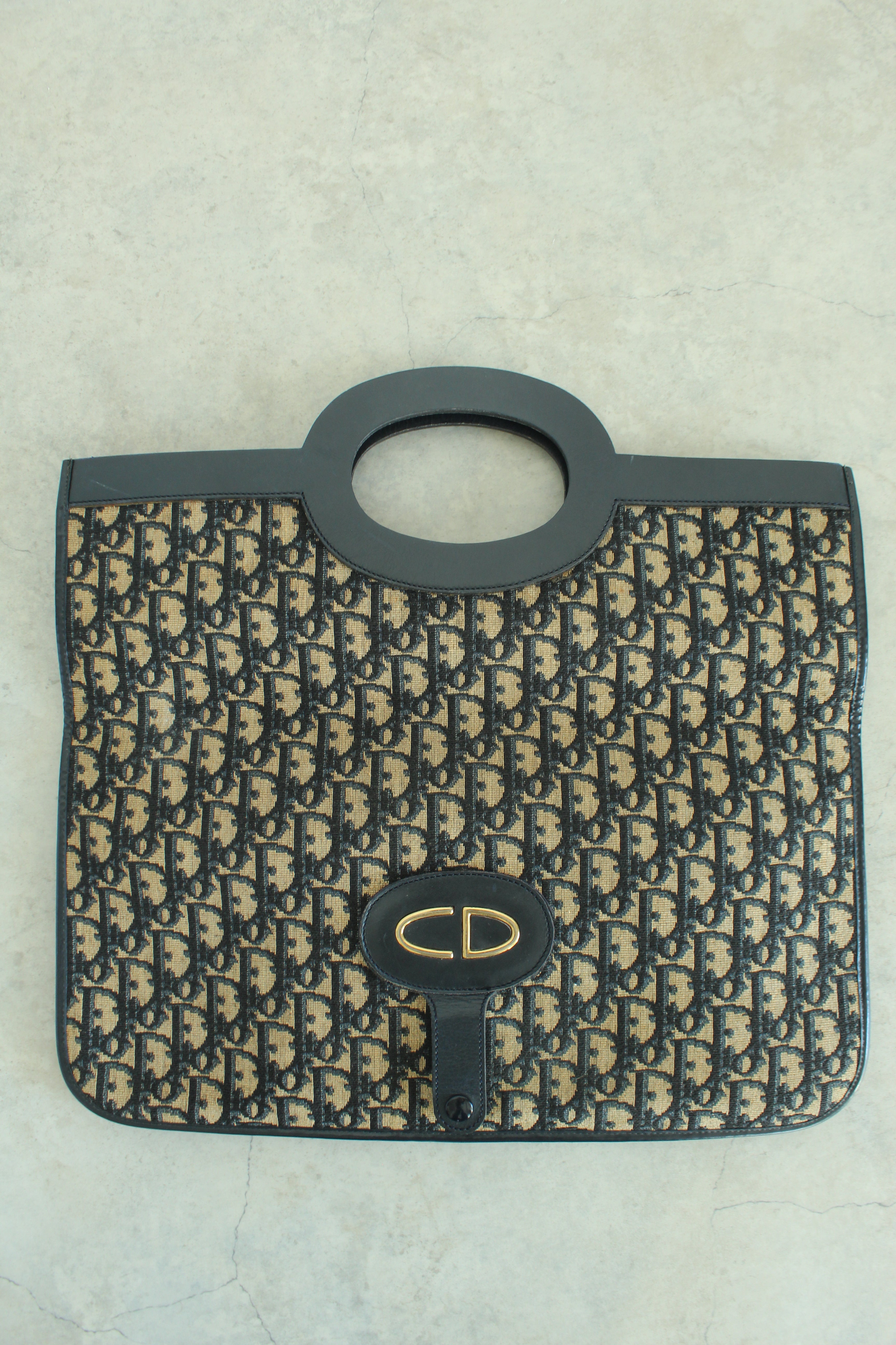 Oblique Fold over clutch in navy blue