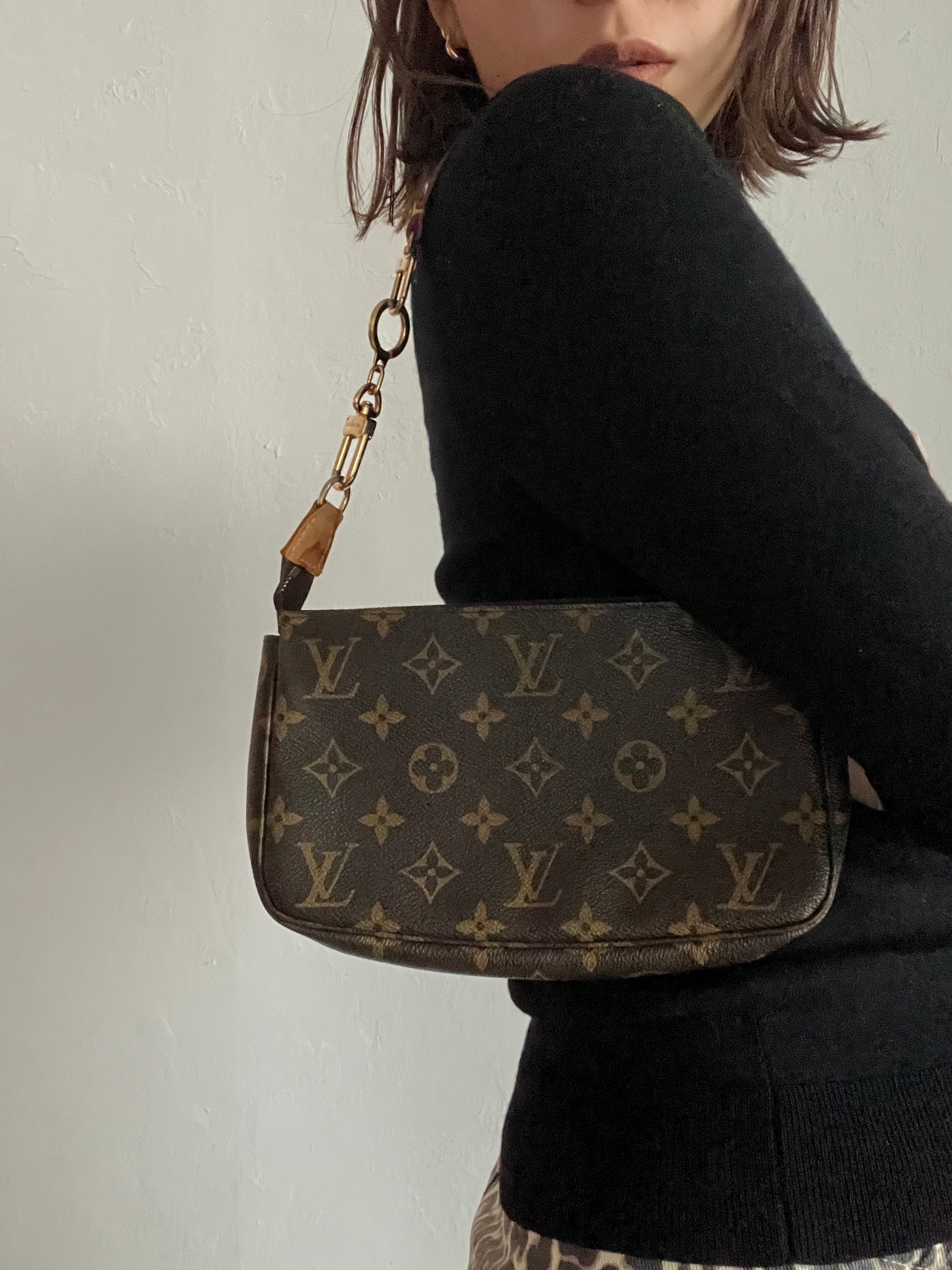 Pochette Accessoires Monogram Canvas (M82766) with a bag charm