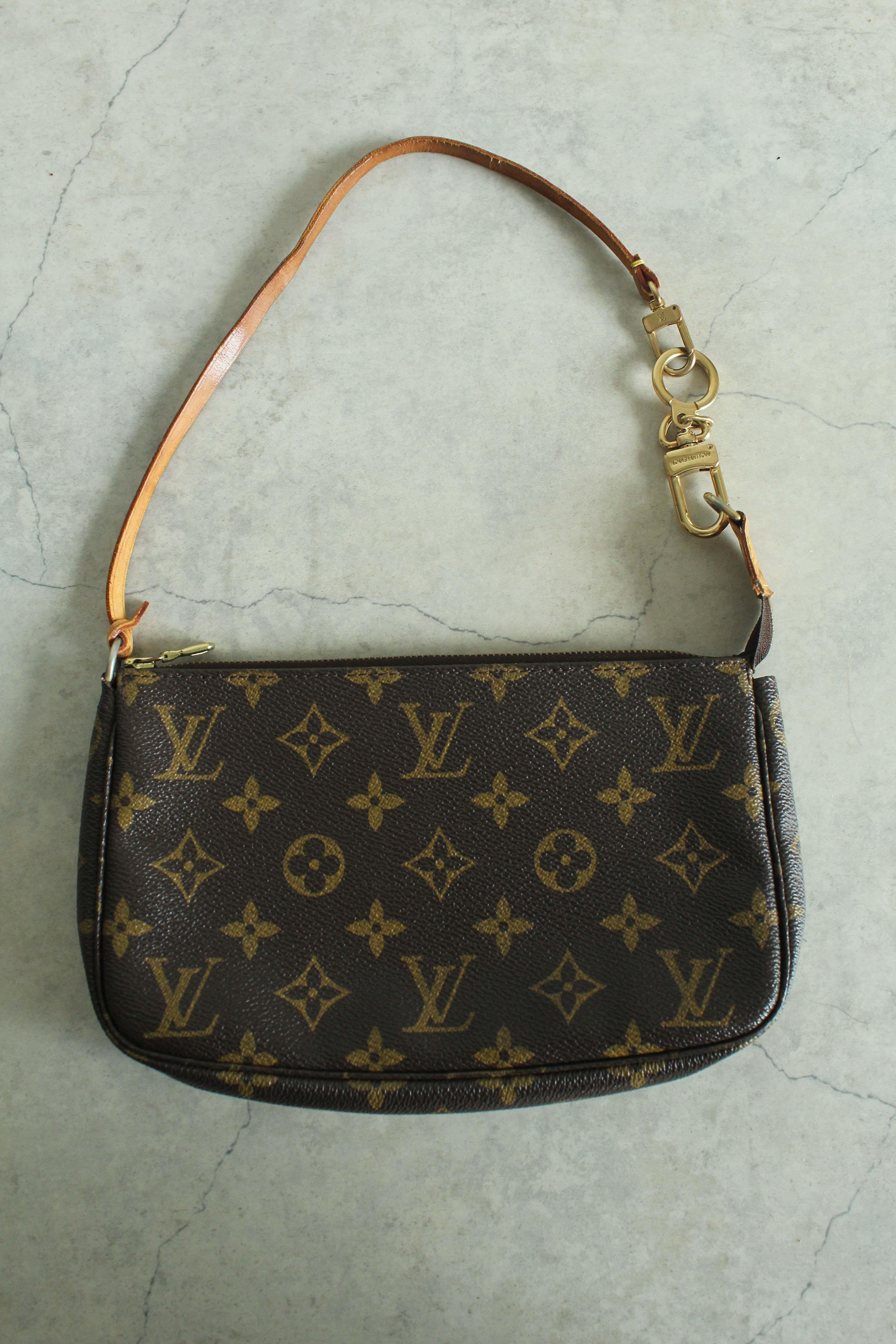 Pochette Accessoires Monogram Canvas (M82766) with a bag charm