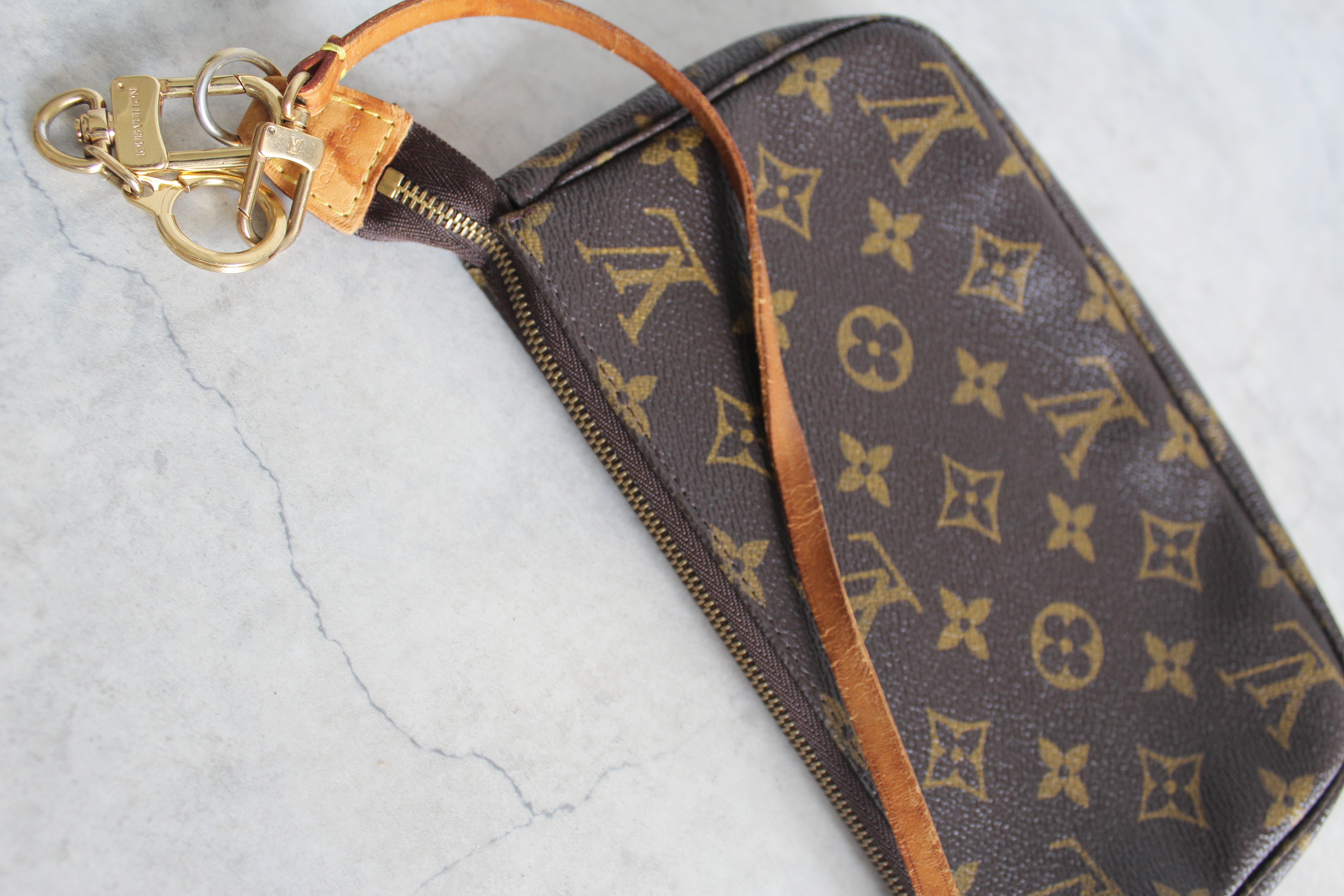 Pochette Accessoires Monogram Canvas (M82766) with a bag charm