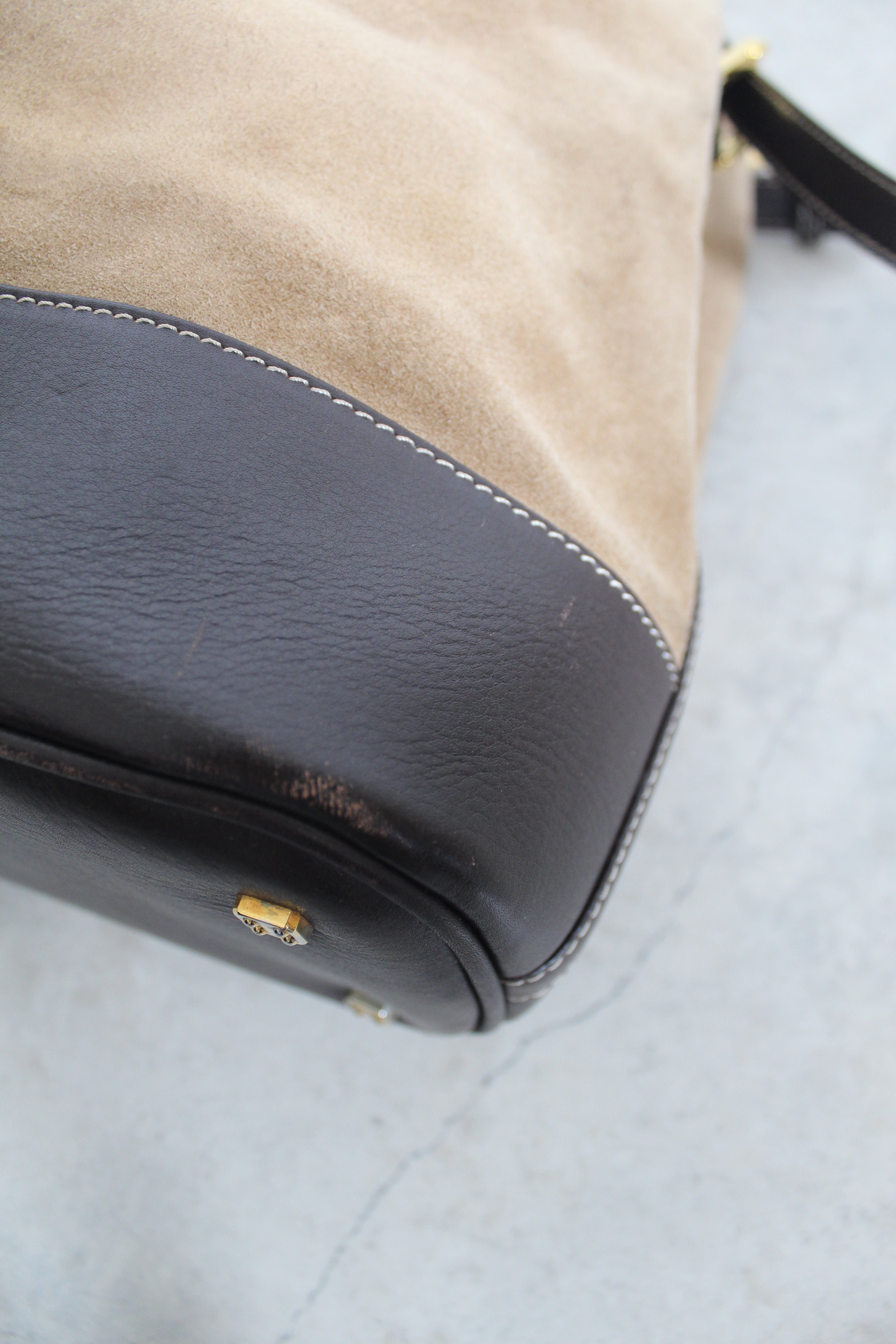 Anagram Suede Drawstring Bucket Bag