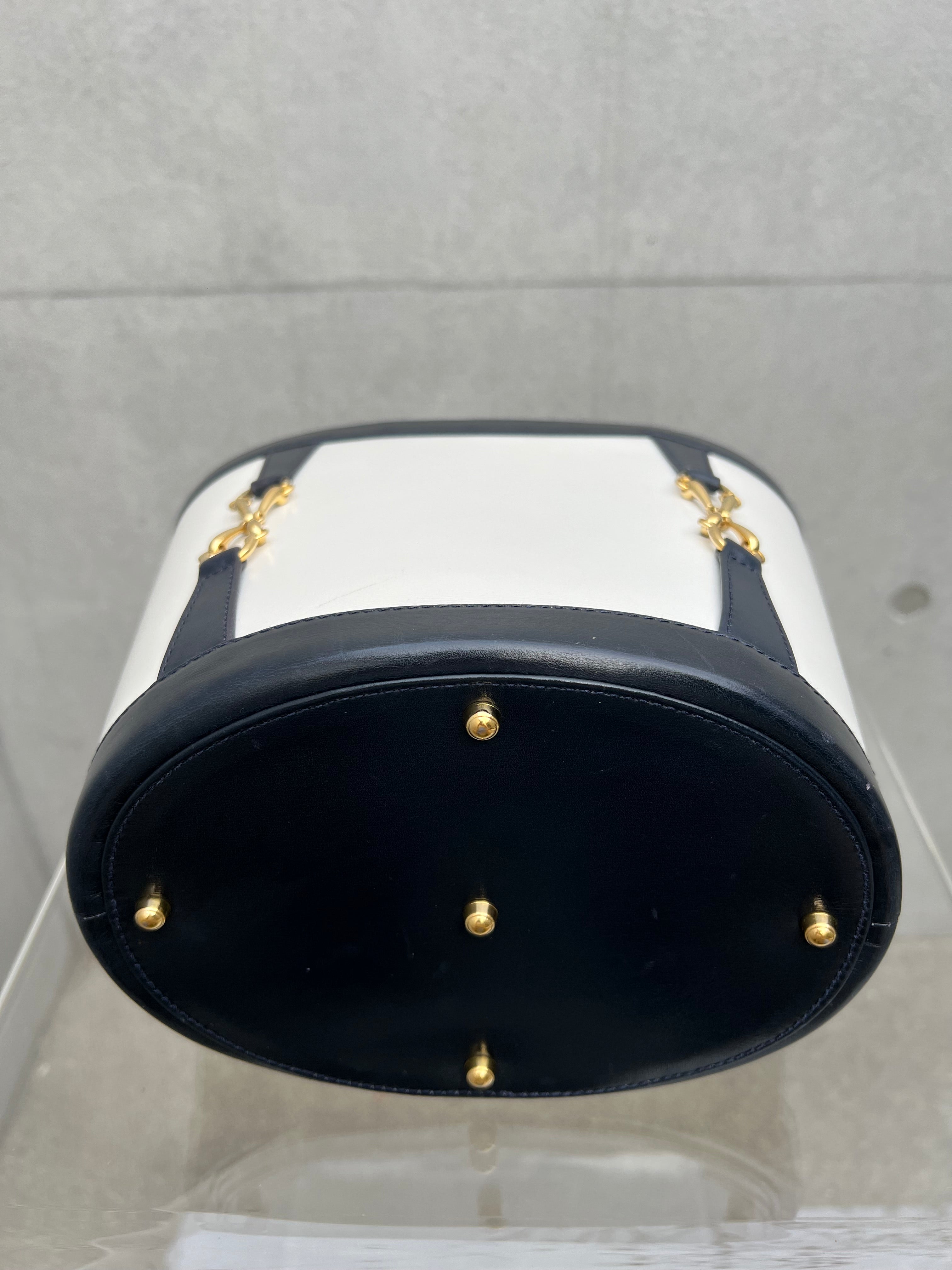 Horsebit Bucket Bag in Black and White