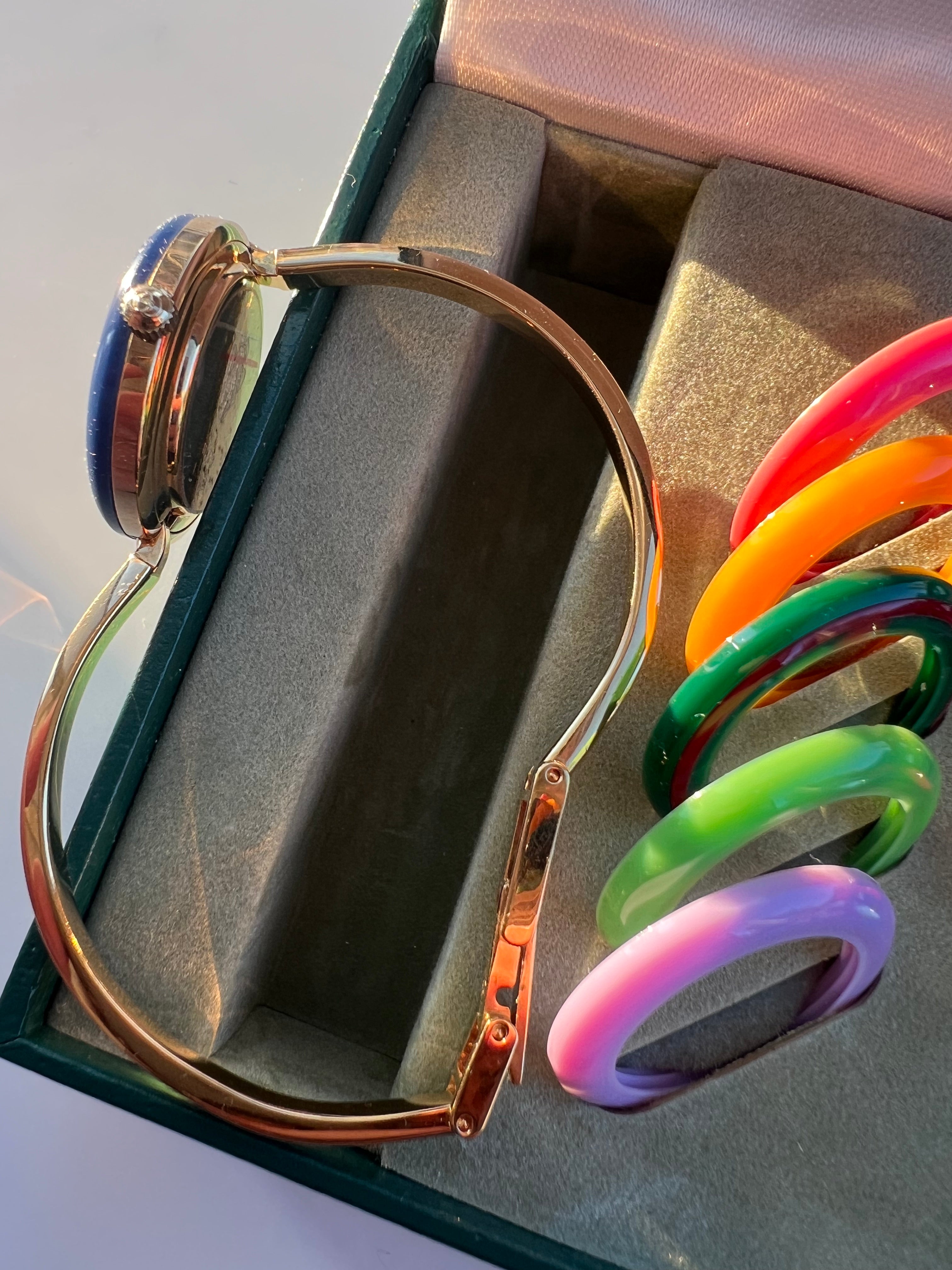 1100L Gold Interchangeable Bezel Watch Set in 12 colors, 1995