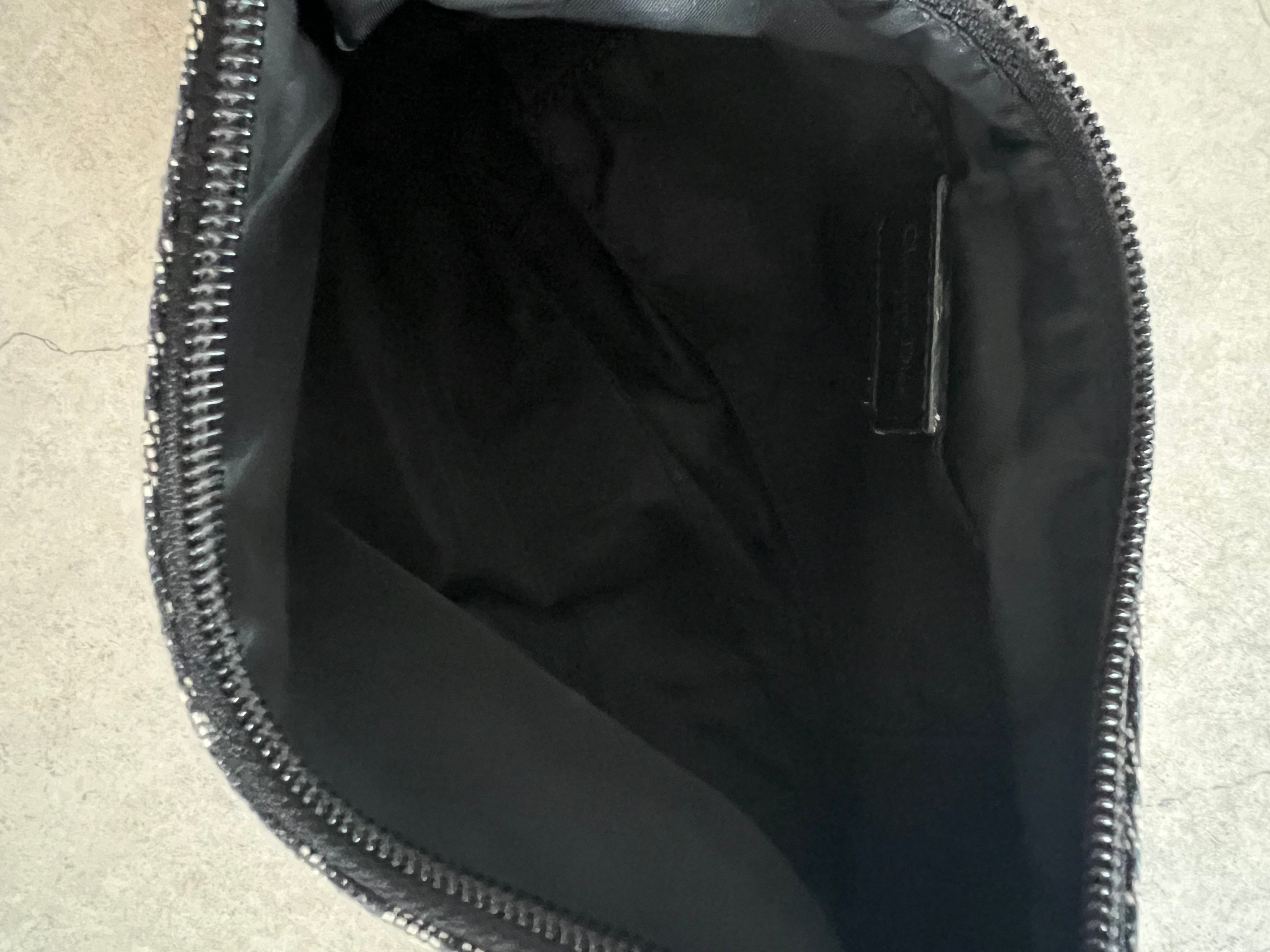 Trotter oblique mini pochette — John Galliano era