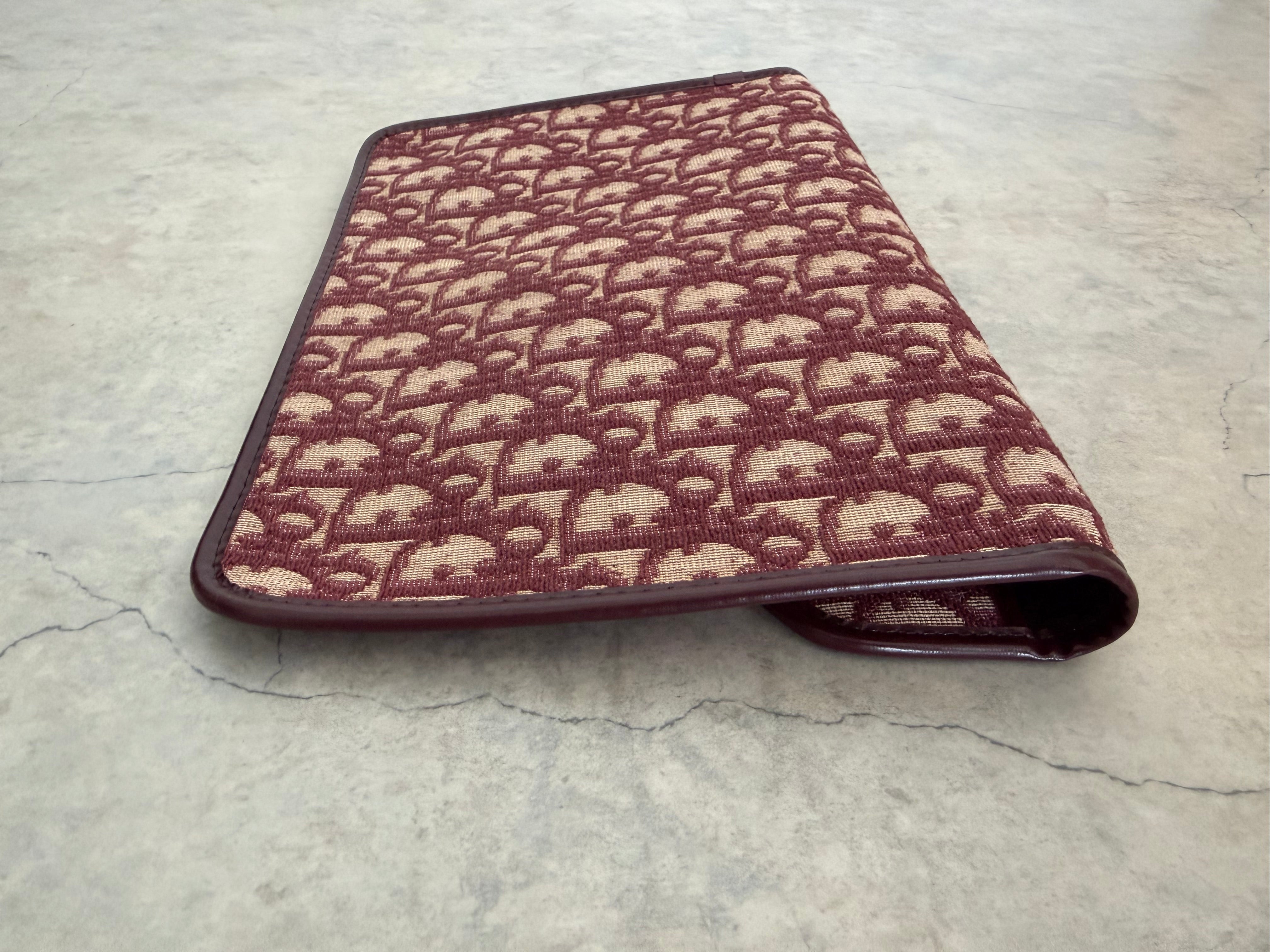 Oblique trotter flap top envelope clutch